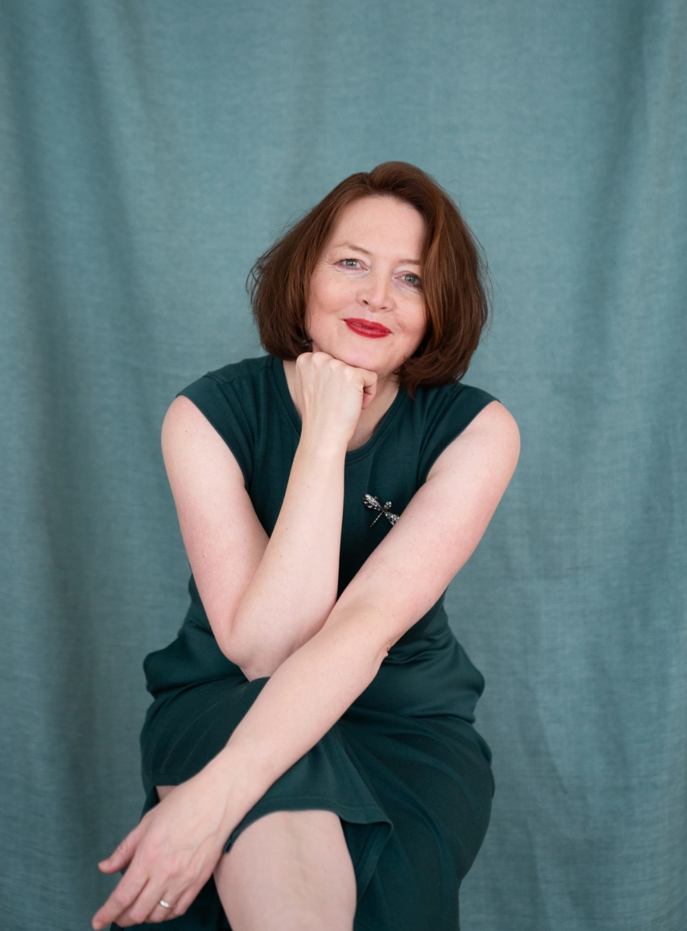 Eike Koch von Reflexionshafen - Coachin aus Hamburg guckt lächelnd den Betrachter an